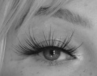 very delicate lashes - likely makeup